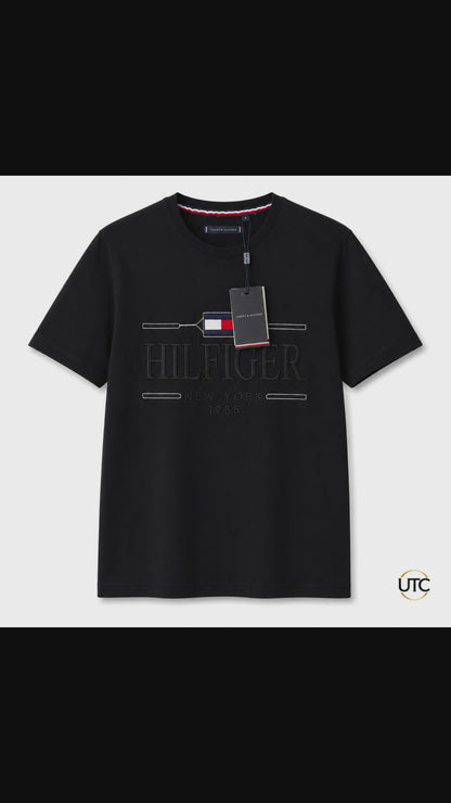 Tommy Hilfiger Men's Logo Graphic T-Shirt – Black | Premium Cotton Crew Neck | New York 1985
