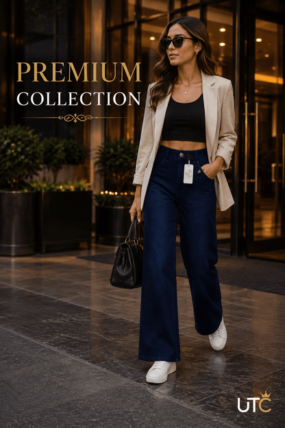 Unique Trend Collection GREY RABBIT dark blue high-waist wide-leg jeans worn by a woman with a blazer and sneakers